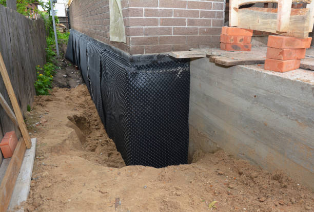 Happy homeowners after waterproofing job in North Bend
